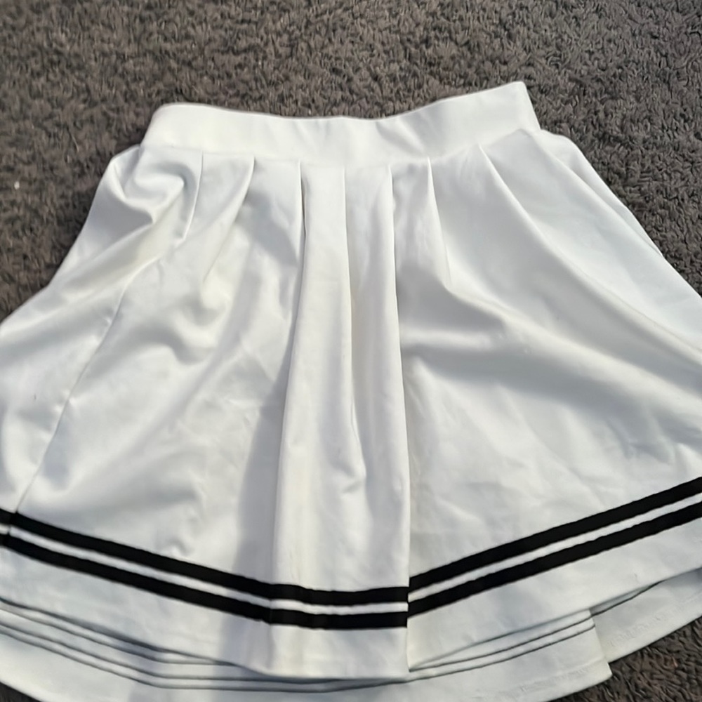 White tennis skirt with black lining